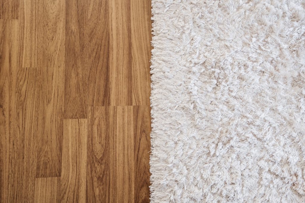 Carpet and floor next to each other